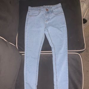 Striped low rise skinny jeans